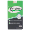 Xylotene Powder box front featuring a tooth with green and black colours.